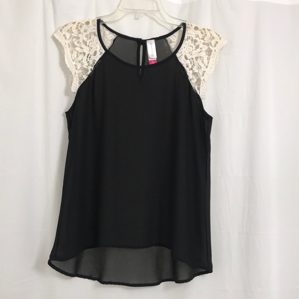 Semi sheer black with crochet sleeves.